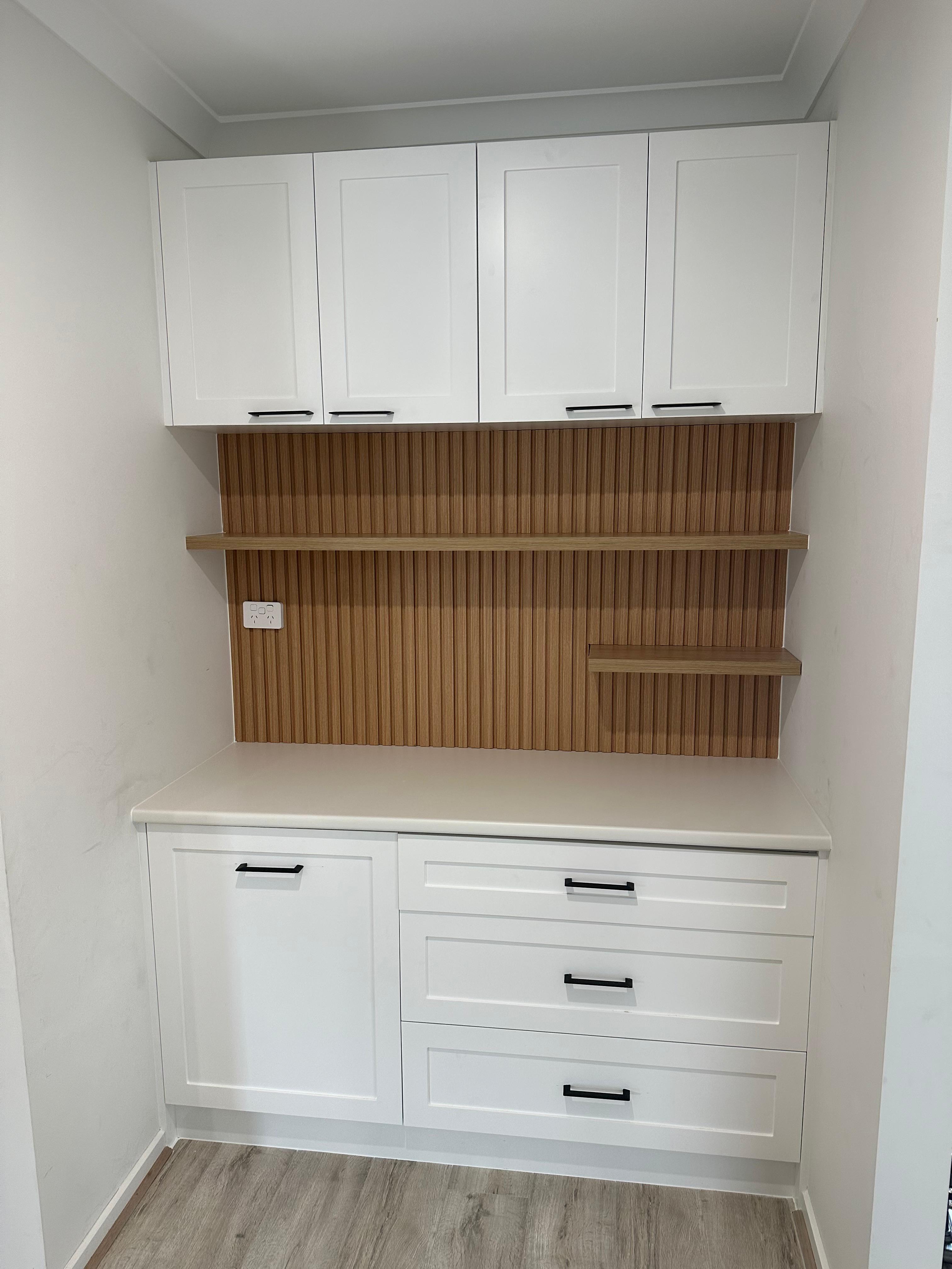 Custom trapezoid-shaped cabinet door built to a bespoke design