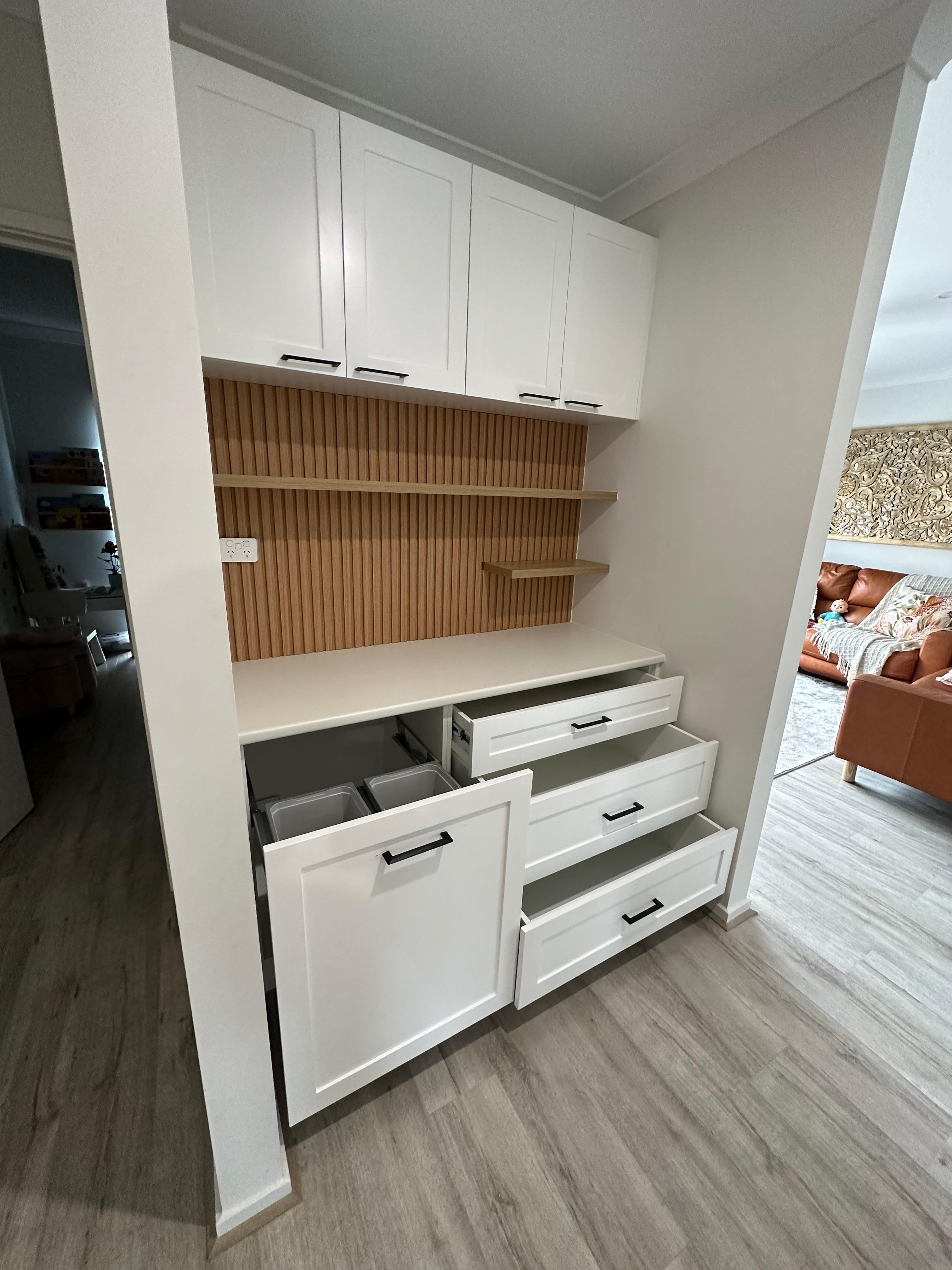 Custom trapezoid-shaped cabinet door built to a bespoke design