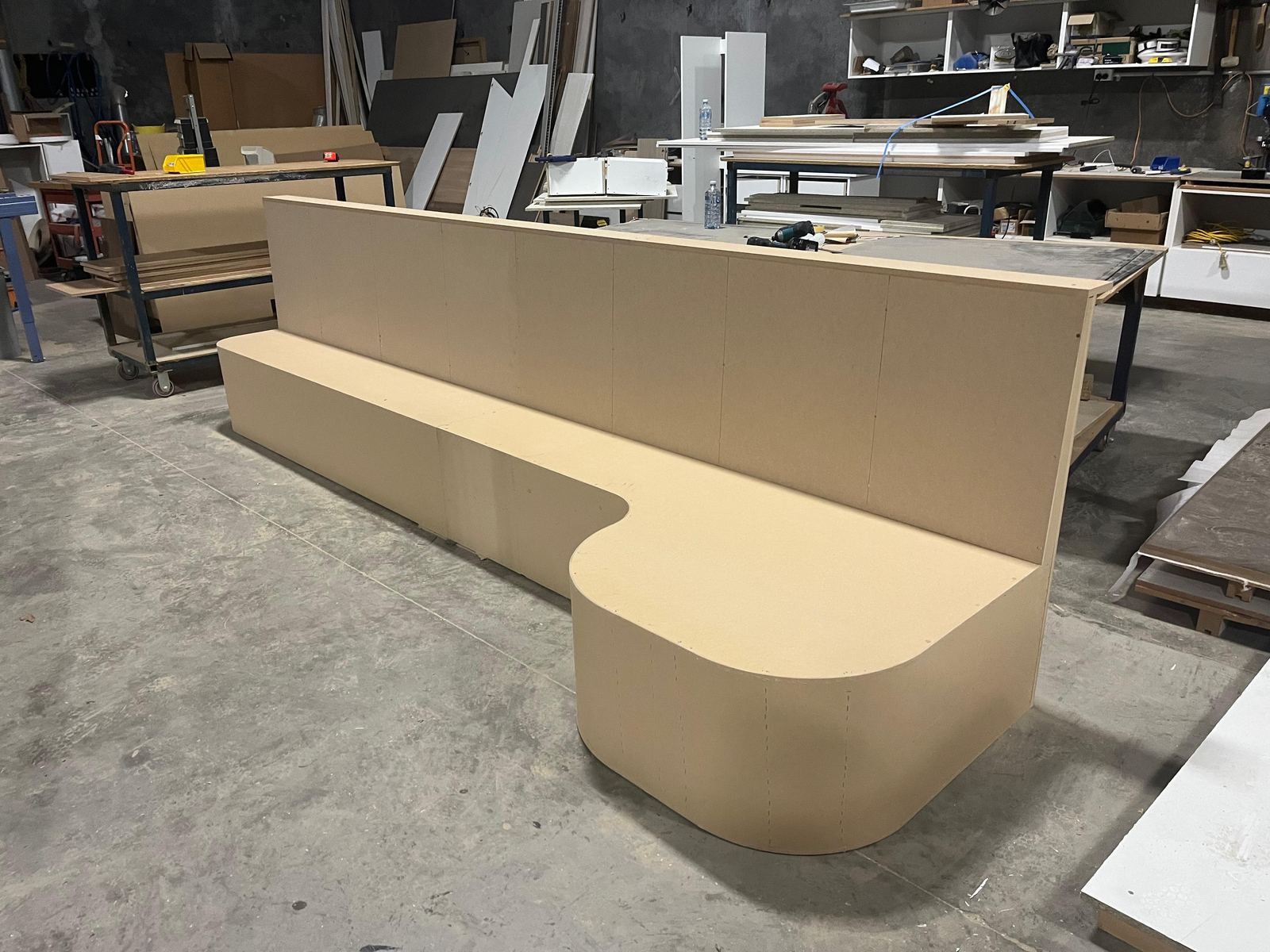 Curved commercial counter under construction in the Oktay Cabinets workshop