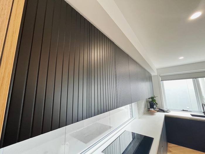 Black kitchen vertical panelling detail