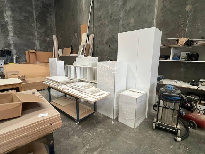 Inside the Oktay Cabinets workshop with finished cabinet boxes