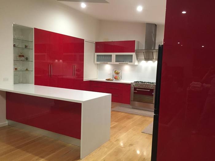 Red gloss kitchen, alternate angle
